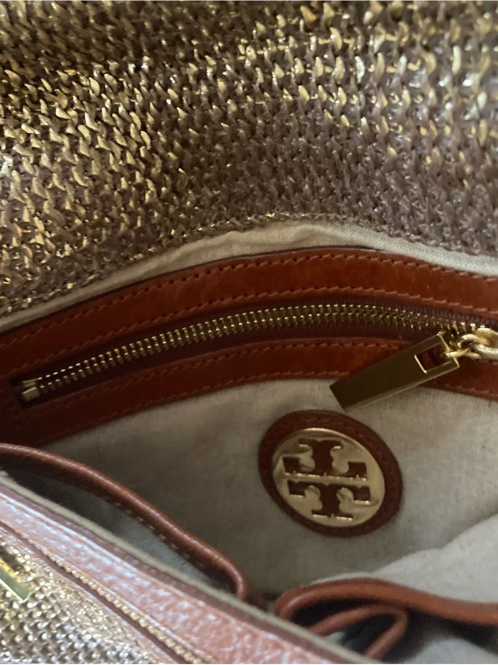 Tory Burch Brown/Gold Woven metallic body,fold over Clutch with big Gold Emblem